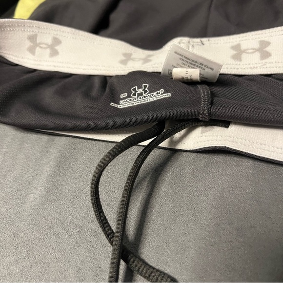 5/$100 Under Armour Grey/Yellow Shorts - Picture 2 of 3